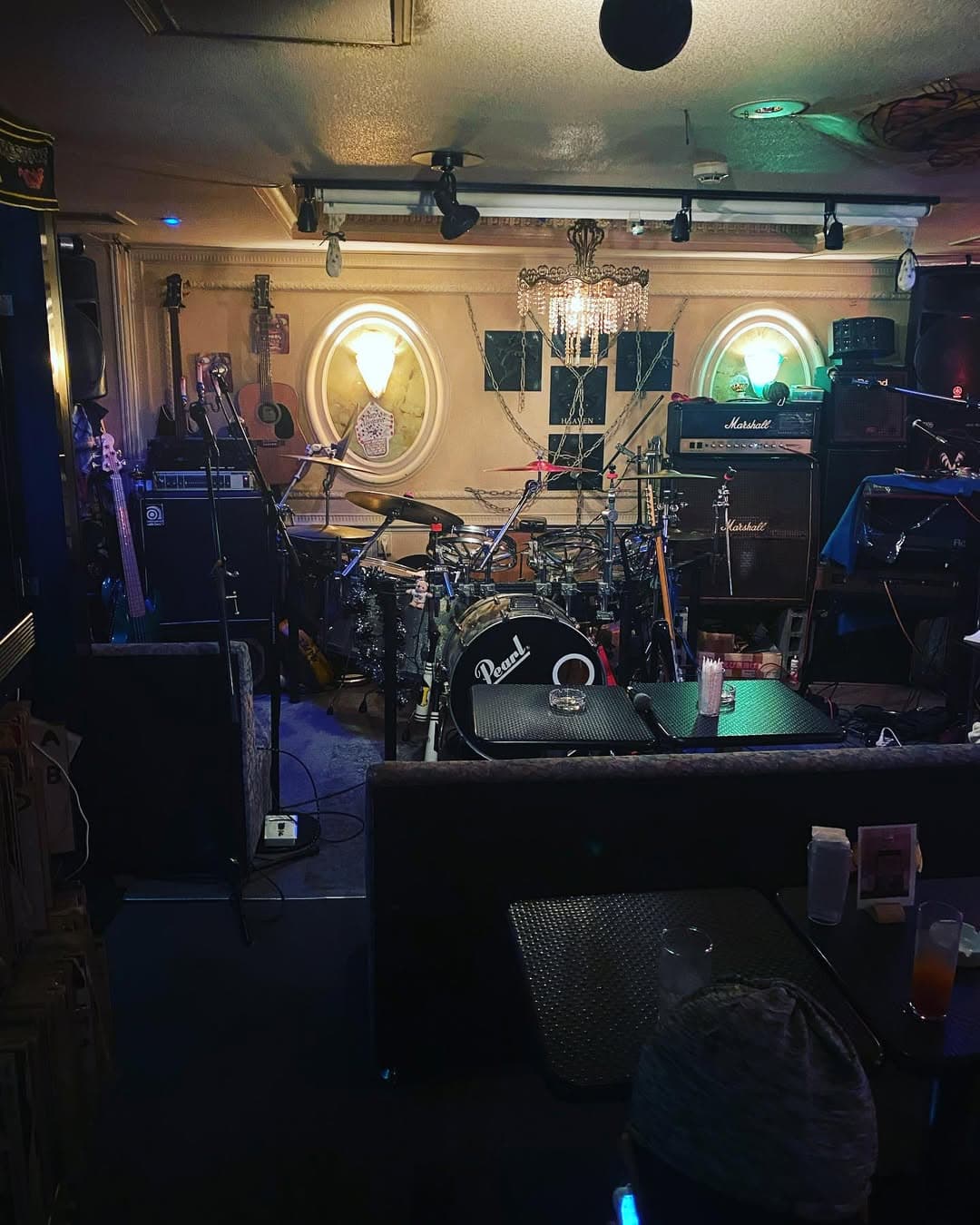 Small underground stage with drums and amps at Rock Bar Heaven Akasaka